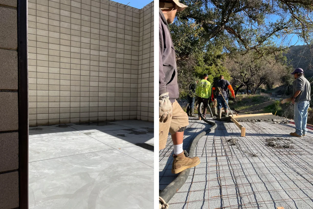 Workers pouring concrete foundation with rebar reinforcing and concrete block walls in a construction site under clear blue sky.