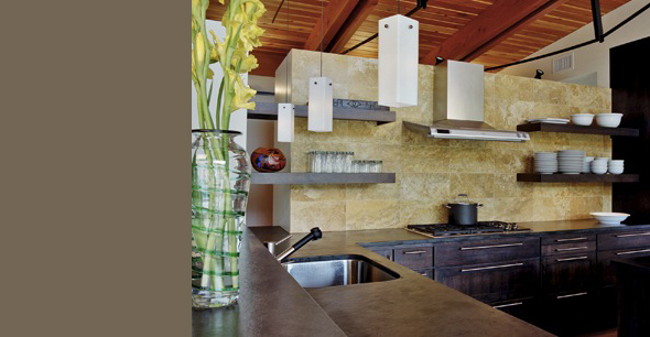 Mountain Meadow House kitchen features dark wood cabinets, stone backsplash, and wooden ceiling beams with pendant lighting.