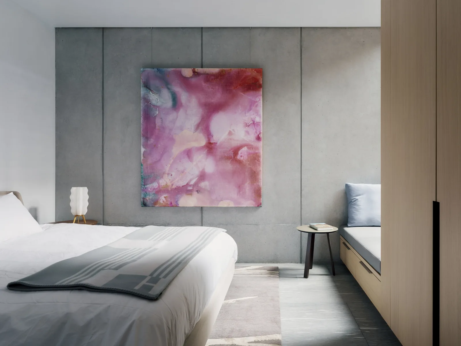 Bedroom interior with concrete panel wall, abstract artwork, white bed, side table, and built-in wooden bench with cushion.