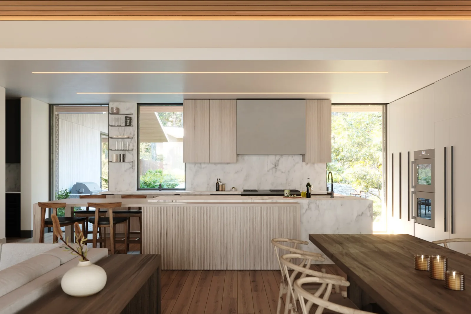 The West Side Road kitchen features marble surfaces and natural light from windows framing garden views.