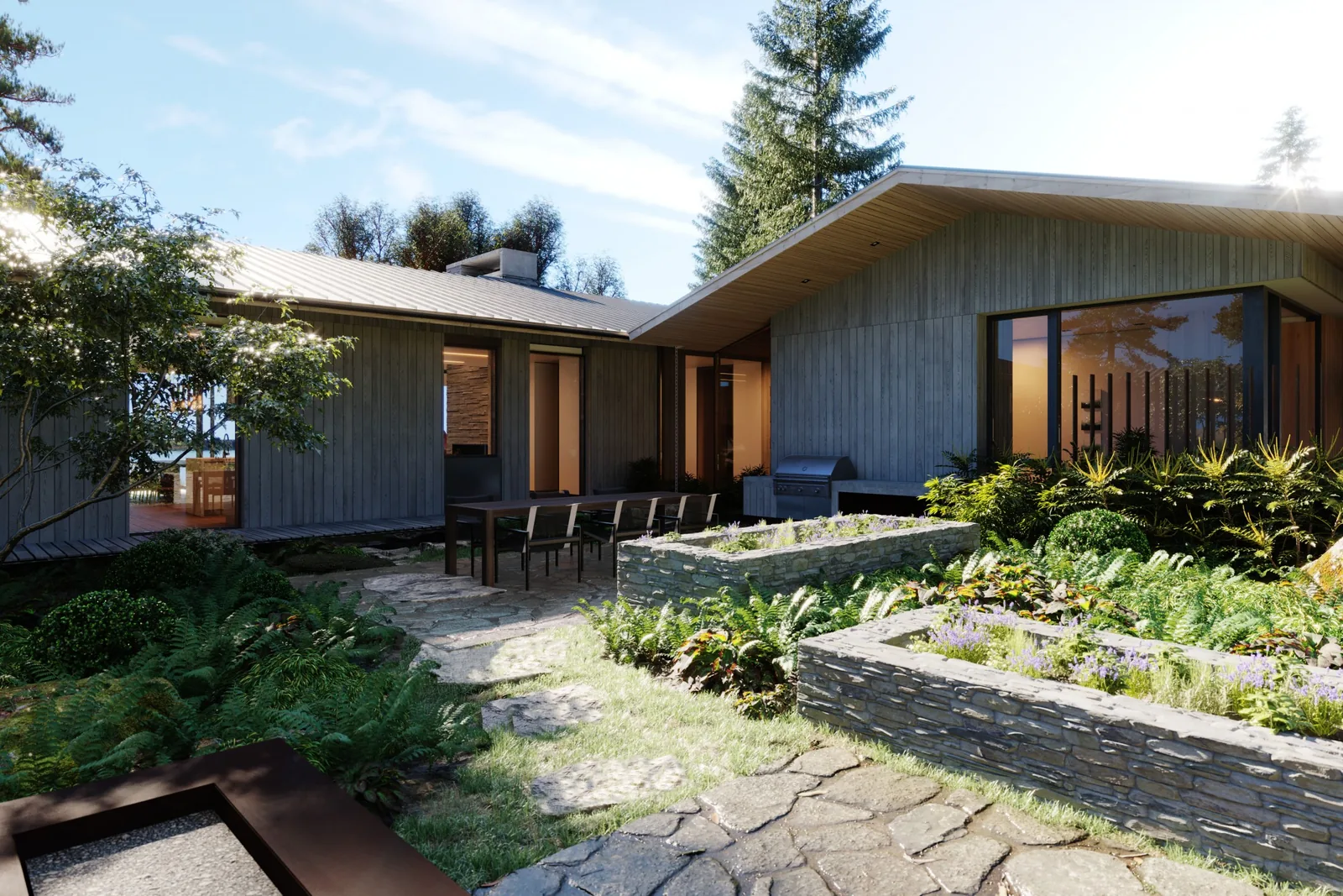 Rear exterior view of a modern house featuring wood siding, stone raised garden beds, and an outdoor dining area with stone paving.