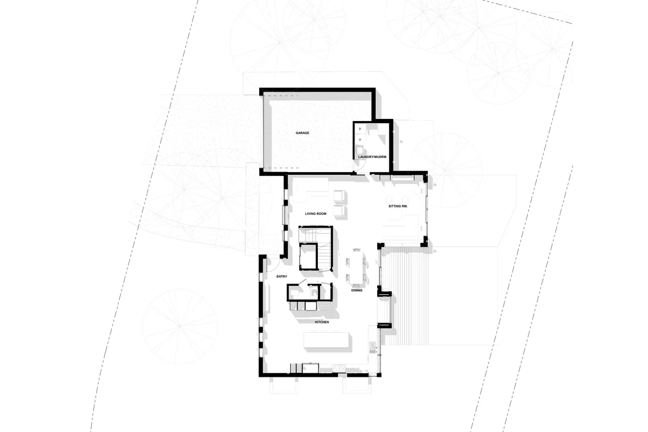 Floor plan showing the ground floor layout of the house including garage, living spaces, and kitchen.