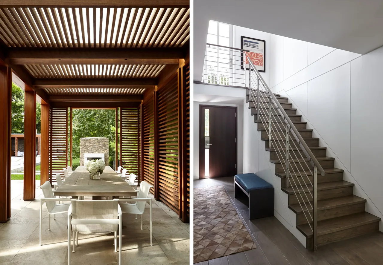 A covered outdoor dining patio with wood slat construction and a stone fireplace is shown next to a modern interior stair leading to a second floor.