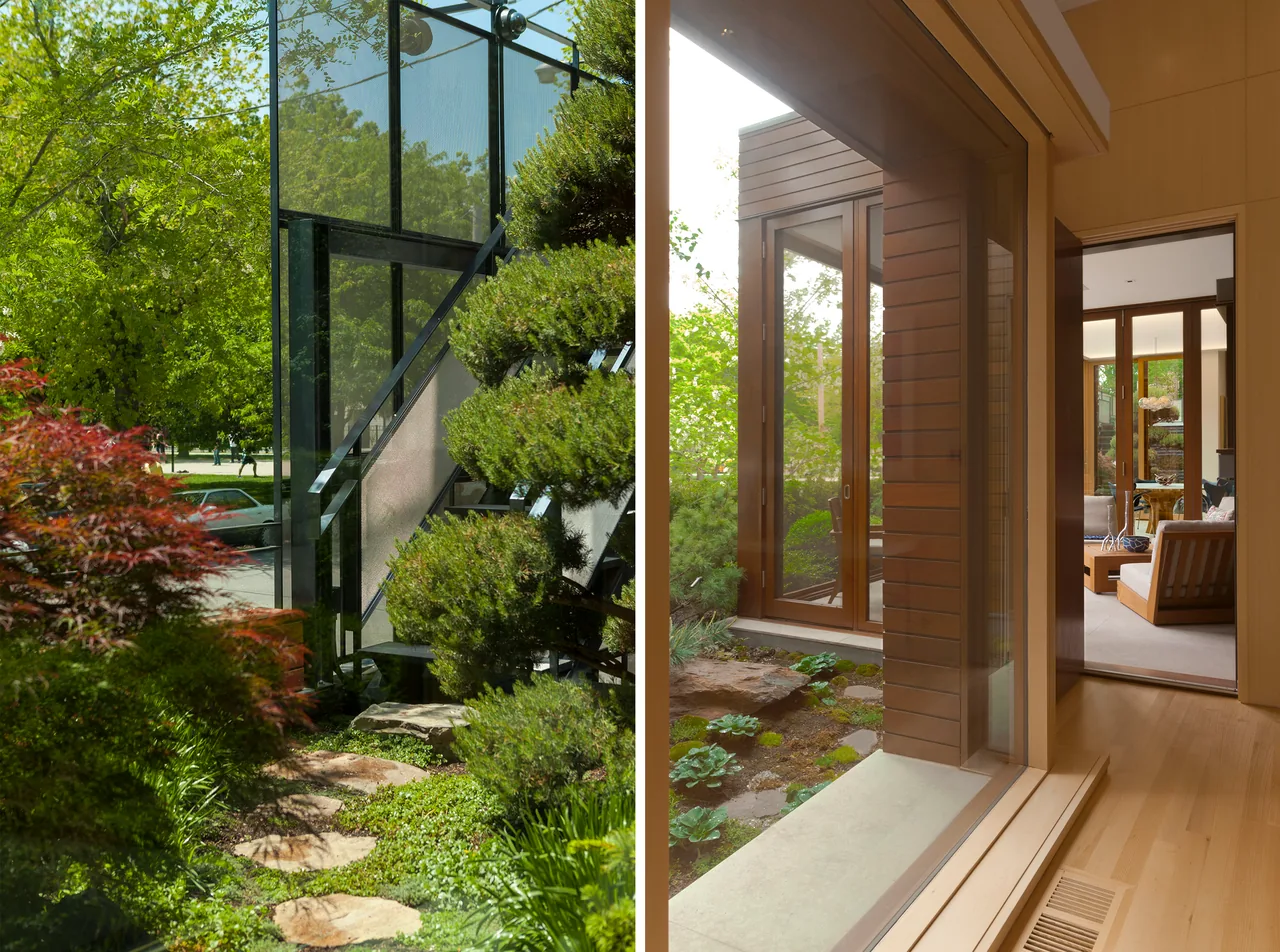 Exterior glass stairs and landscaped garden connect to an interior room through wooden framed doors at Oz Park Residence.