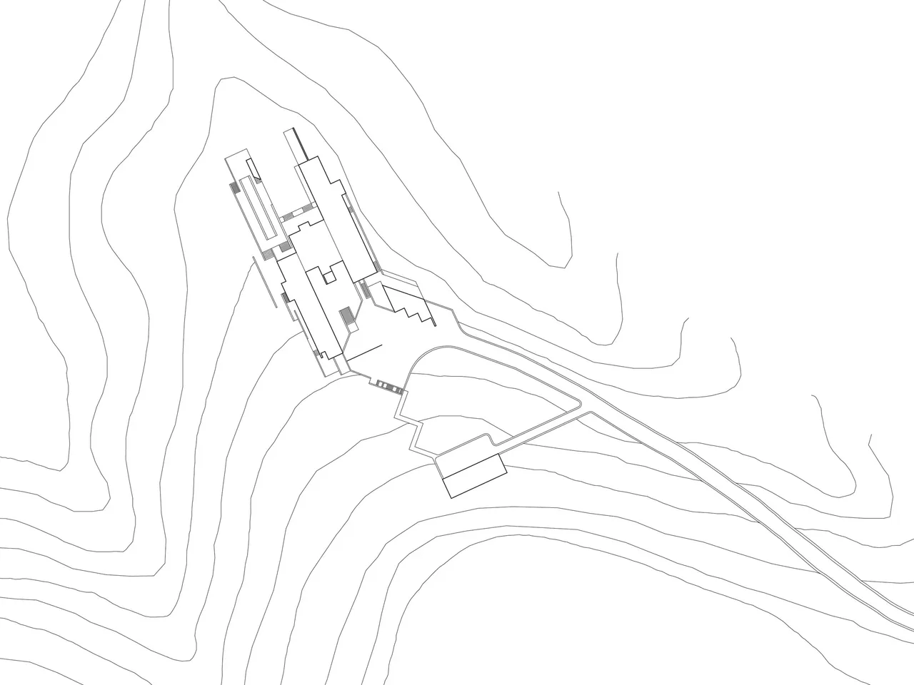 Architectural site plan of the Di Napoli Residence showing building placement and surrounding topography.