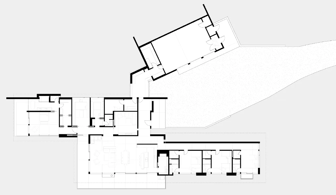 Floor plan drawing of the Wyoming Residence by Abramson Houses, showing room layout and site adaptation.