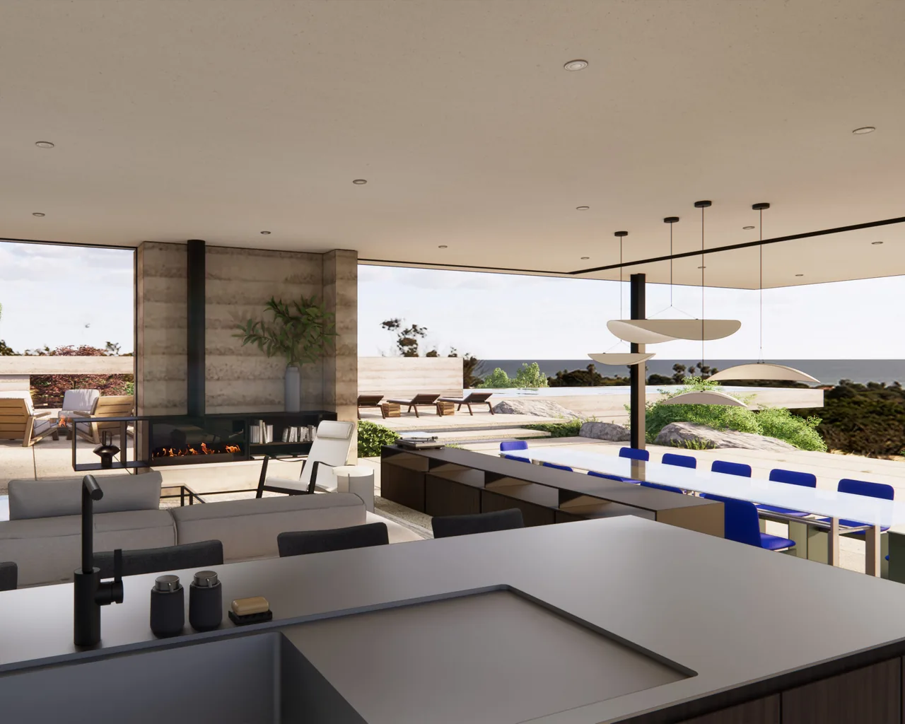 Open living and dining space with floor-to-ceiling glazing and a central fireplace, offering ocean views.
