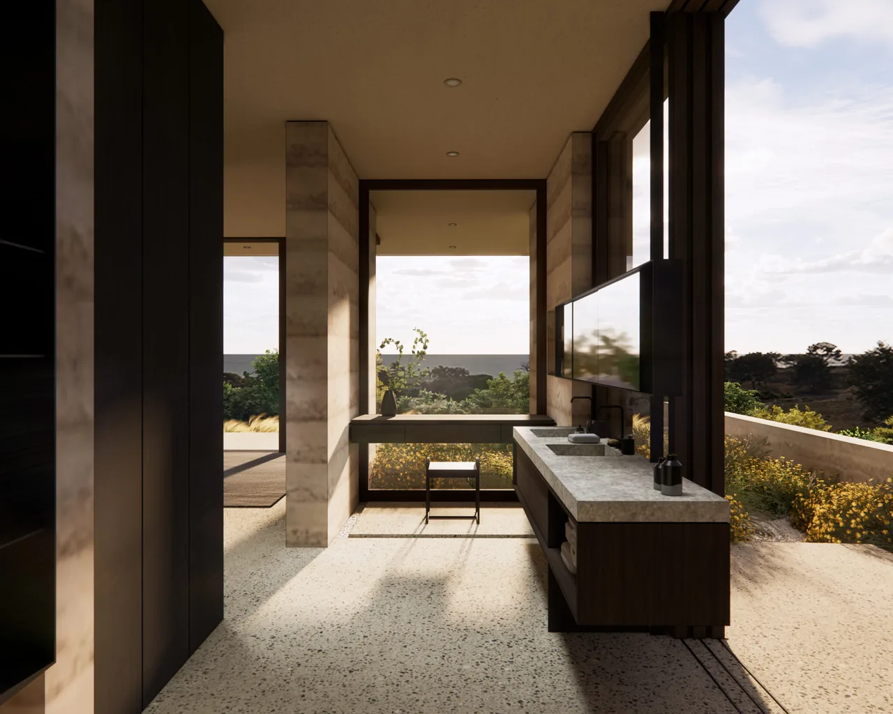 Interior view of a bathroom featuring floor-to-ceiling glazing and rammed earth walls with a double vanity and integrated mirror.