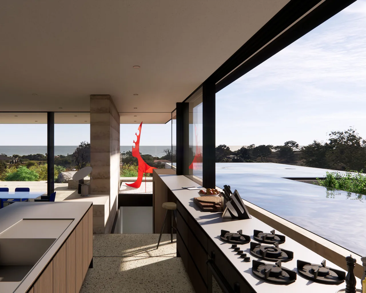 Kitchen interior with gas range and large open window providing a coastal view.