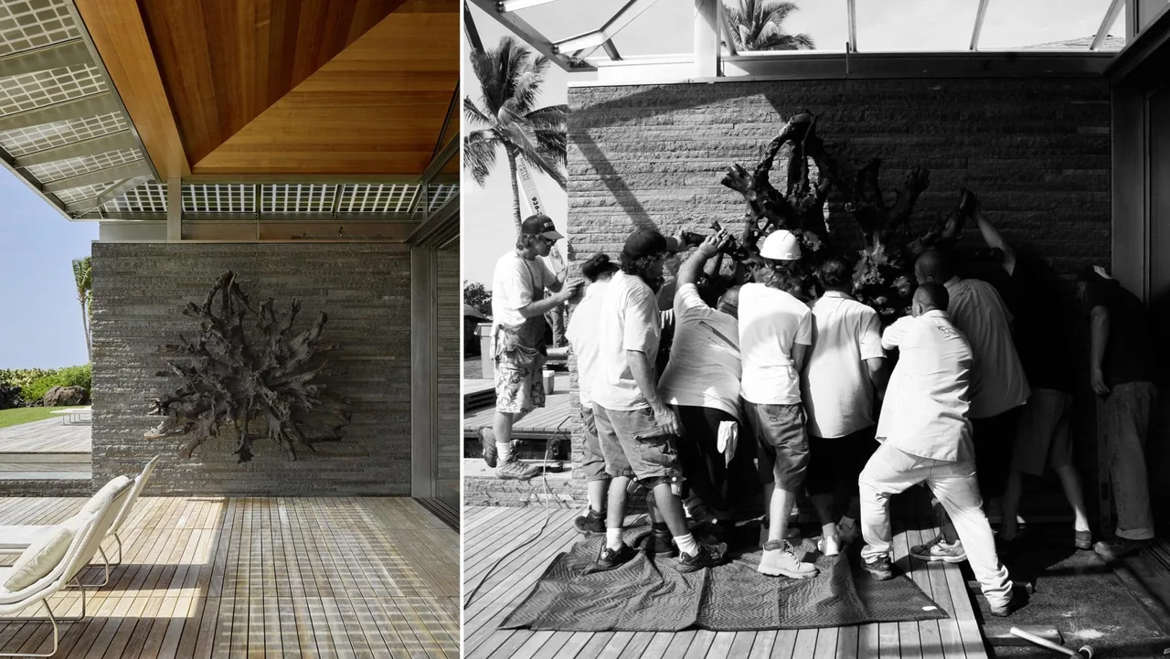 Textured stone wall with circular driftwood sculpture at a residence, alongside an image of workers positioning the sculpture.