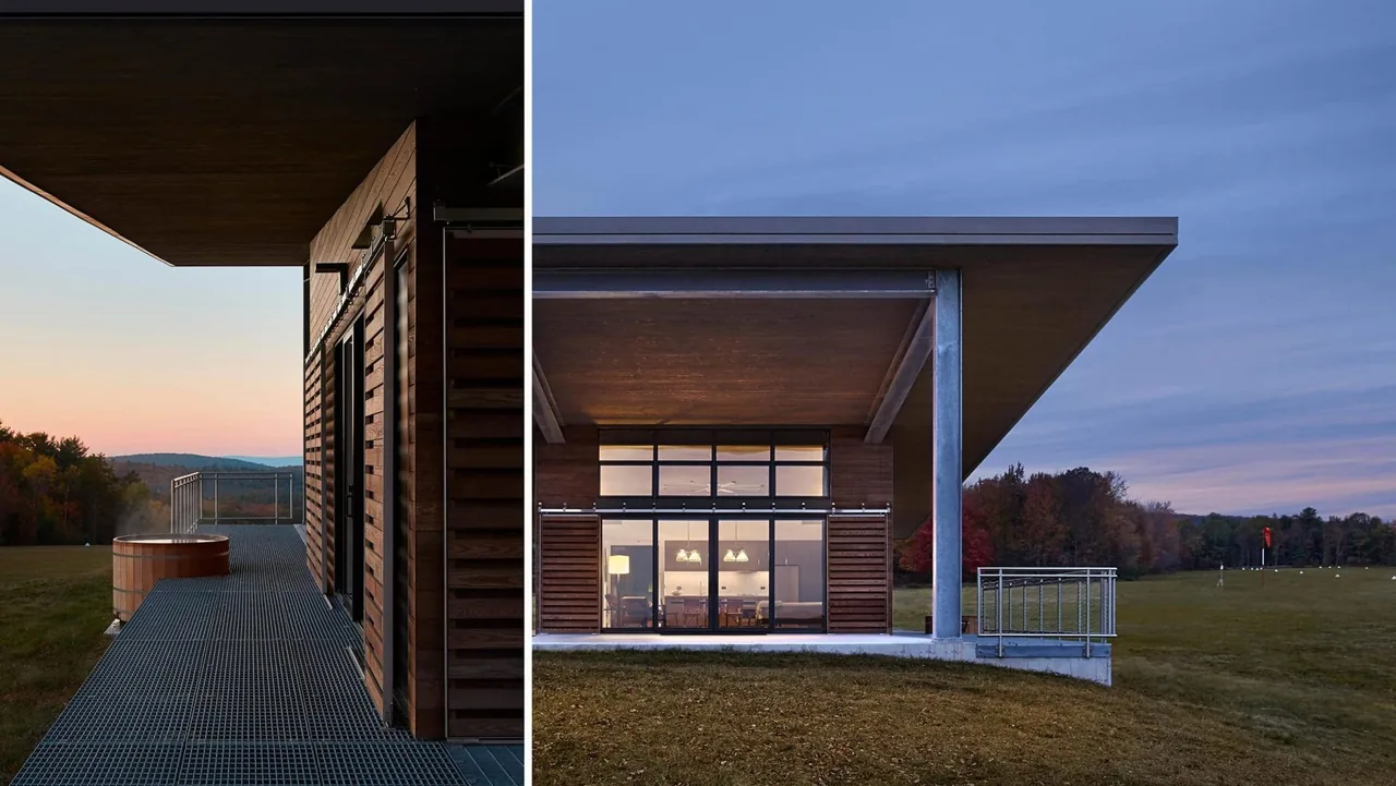 The Flying Dollar Residence by Lundberg Design features wood siding and large glass walls framed by a deep overhanging roof, opening to an open landscape.