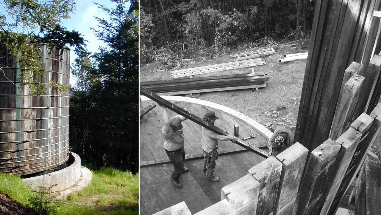 The Lundberg/Breuer Cabin features a round concrete foundation and a weathered metal cylindrical structure in a forested setting.
