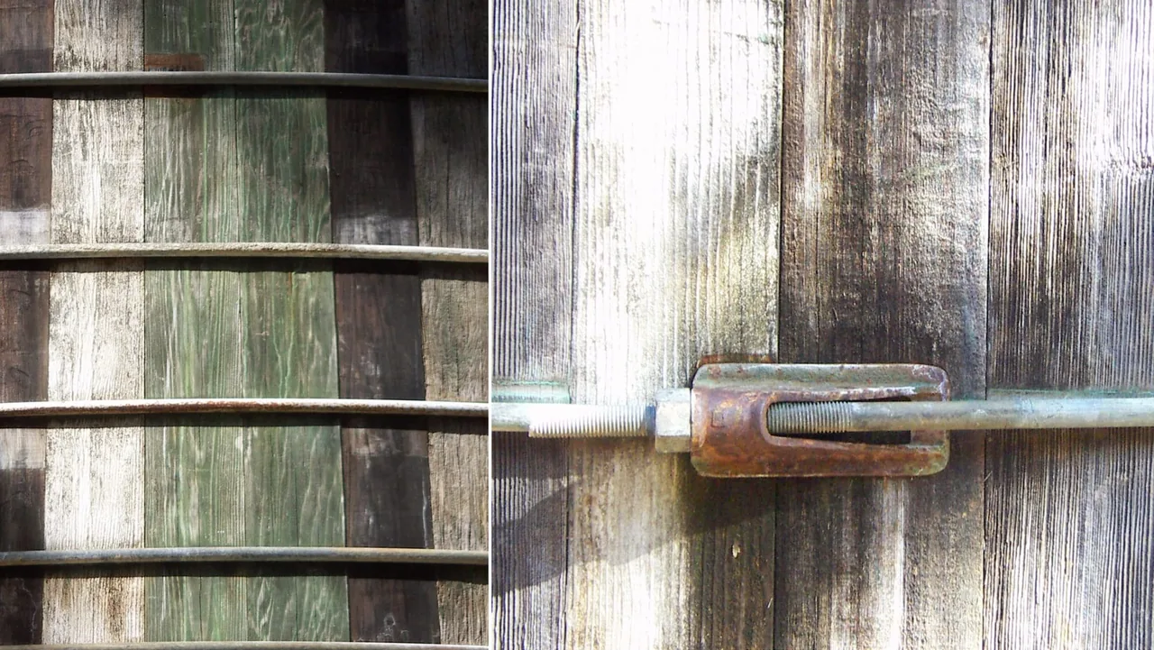 Weathered wood cladding with metal tension rods and a rusted turnbuckle for structural support.