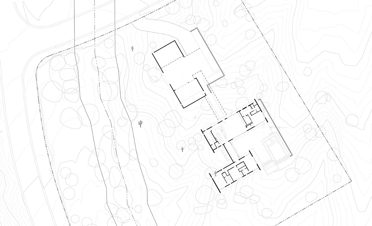 Site plan of Ibarra Rosano project depicting contour lines, two building structures, and desert landscaping elements.