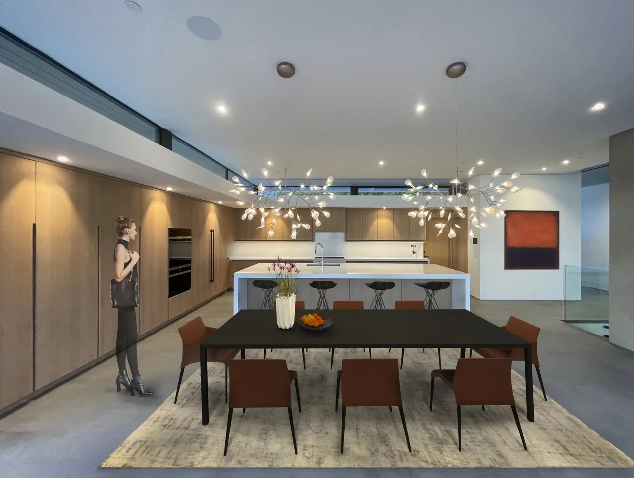 Open kitchen and dining space with wooden wall cabinets, white island with bar stools, and modern pendant lighting above a black dining table.