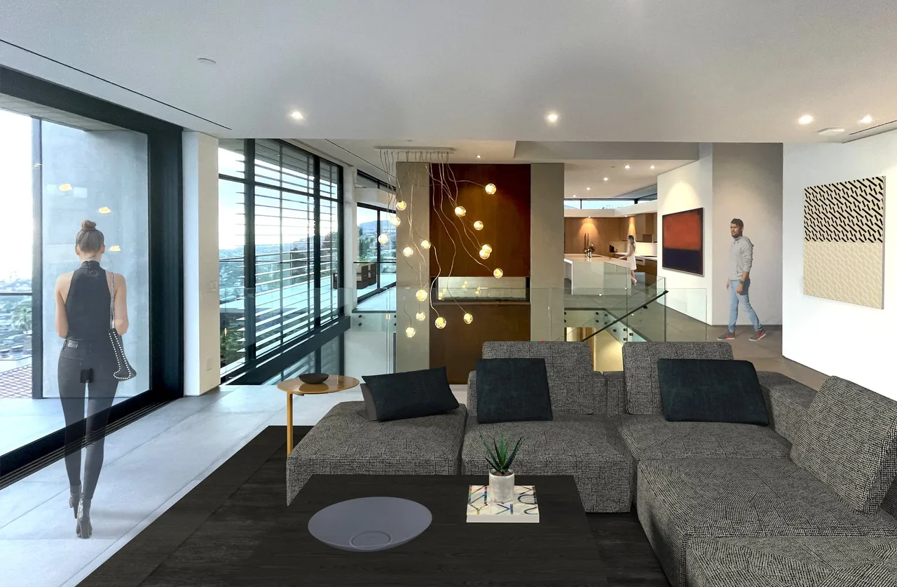 ANACAPA HOUSE living area featuring a large gray sectional, black window frames, and glass railing by LeTourneau Architecture.