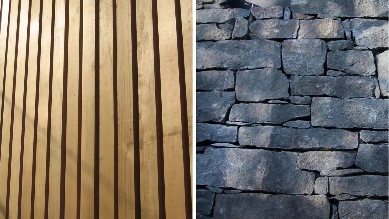 Vertical wood siding and rough-cut stone wall materials on a building exterior.
