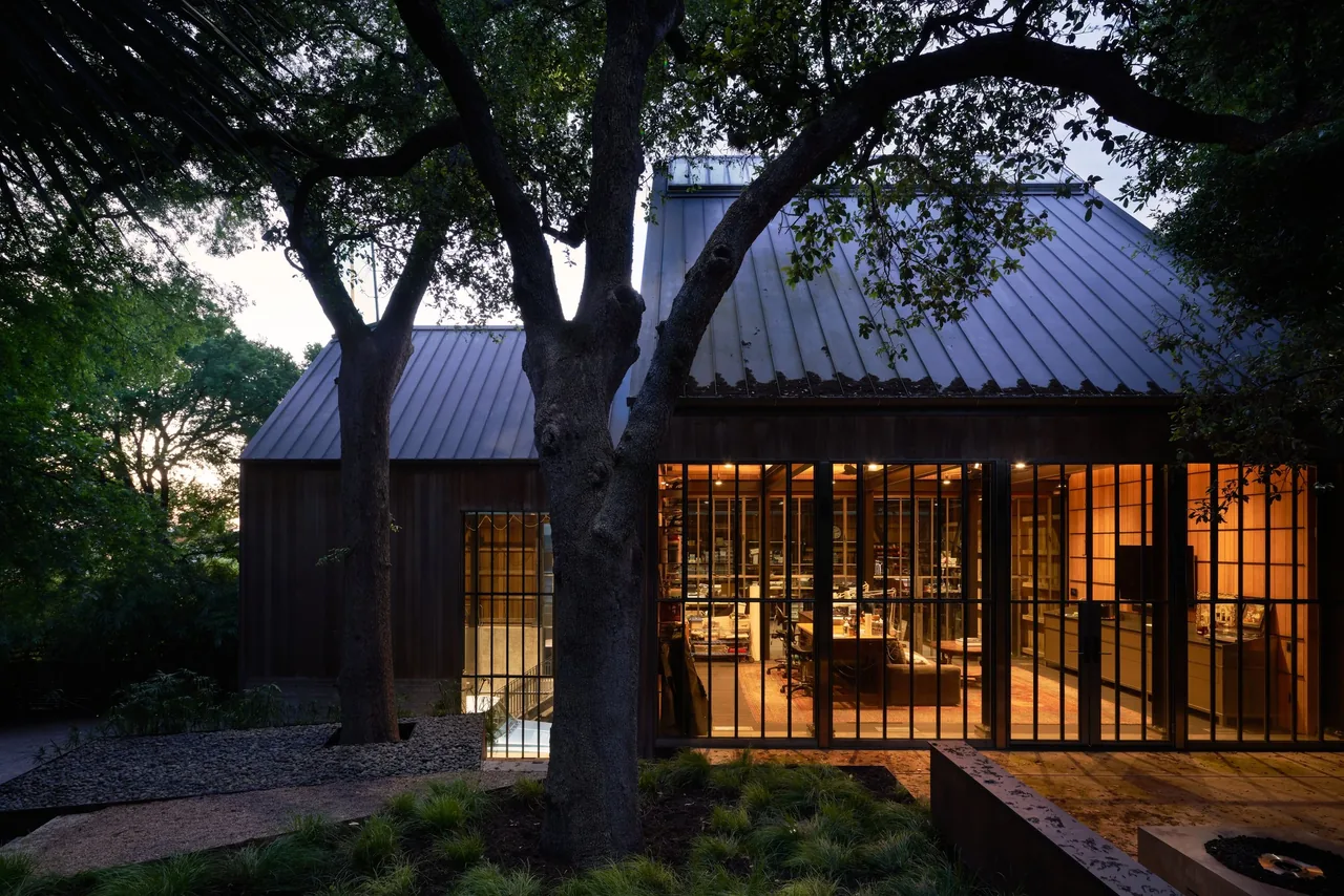 Our Lady of the Alley features industrial design with vertical wood paneling and metal grid windows.