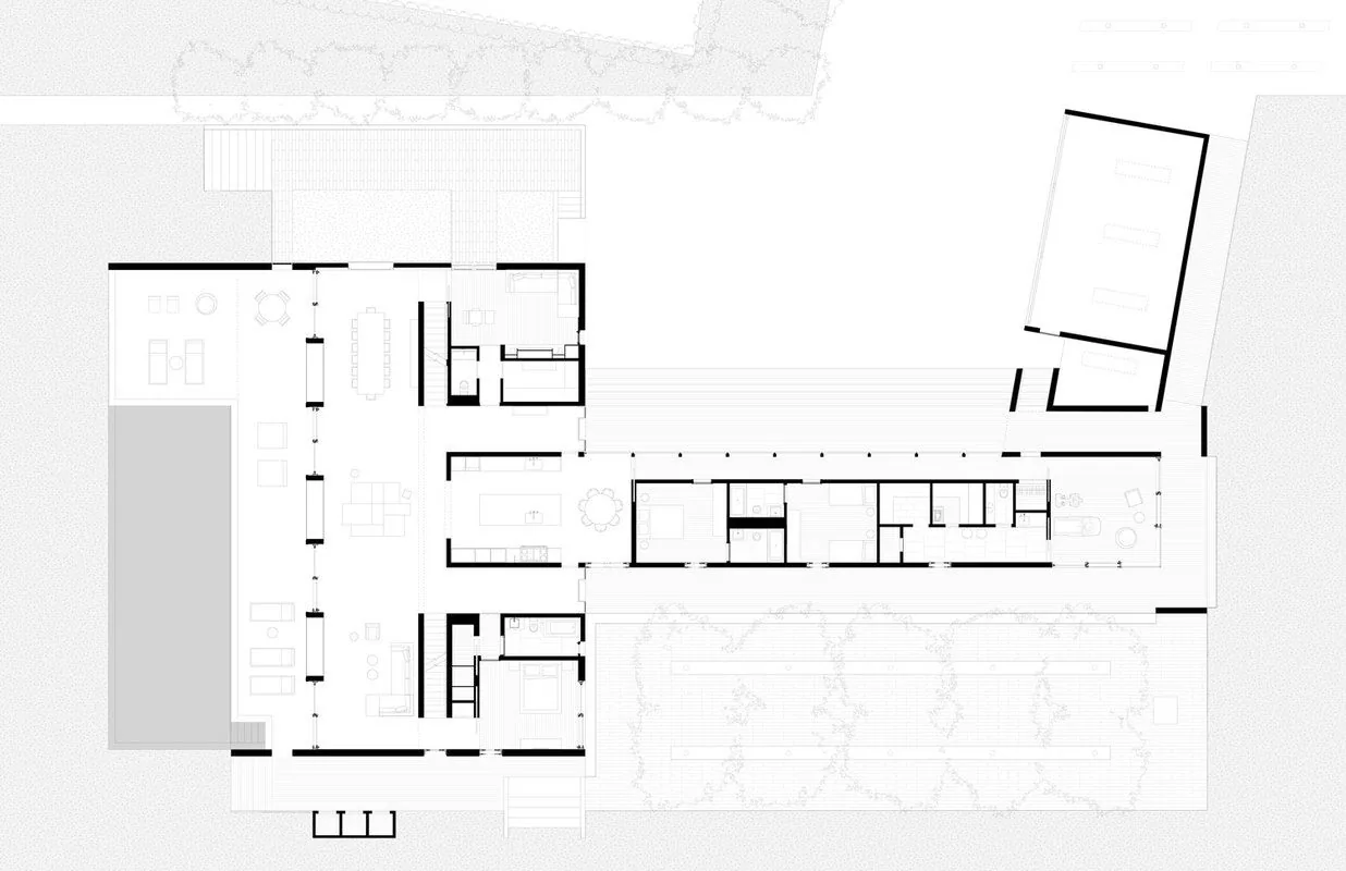 This is a floor plan of the Watermill Residence designed by Andrew Berman Architect showing room division and pool placement.