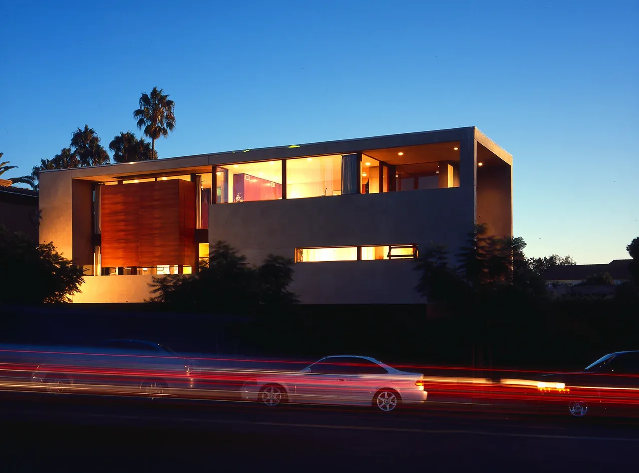 The Prospect by Jonathan Segal features modern flat-roof design with expansive glazing and wood accent panels in San Diego.