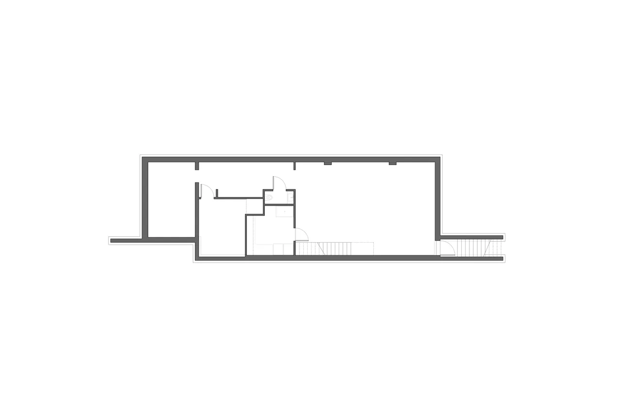 Floor plan showing room arrangements and stair placement in a residential project.