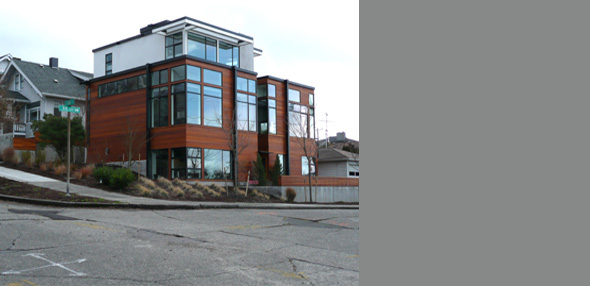 Sunset Hill project by Studio Ectypos features wood panel siding, extensive glazing, and a flat roof in Seattle.