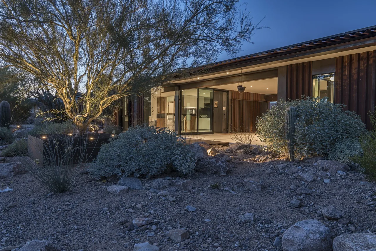 4018 casita by The Construction Zone features desert landscaping with native plants and an open patio area in Phoenix.