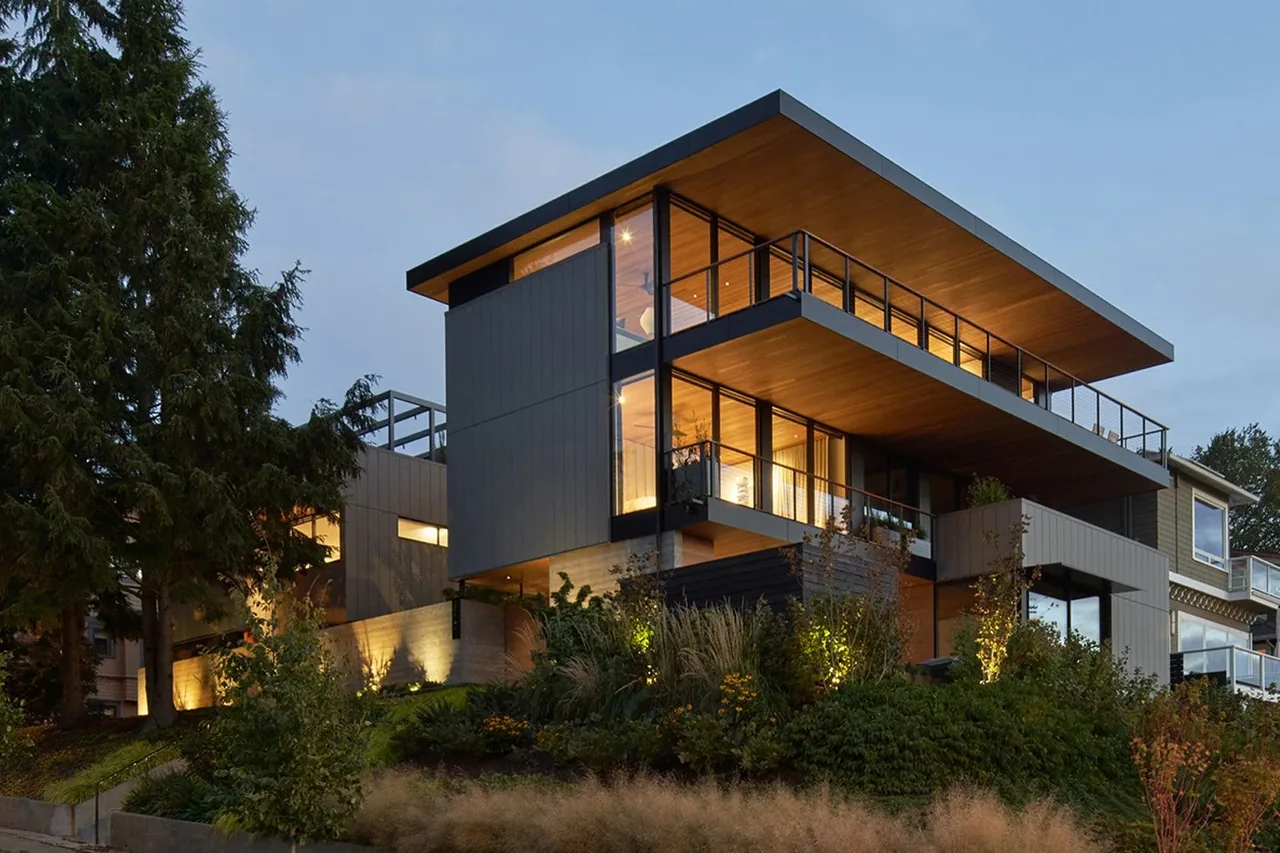 The Perch by Chadbourne + Doss Architects features a modern design with extensive glazing and overhanging flat roofs.