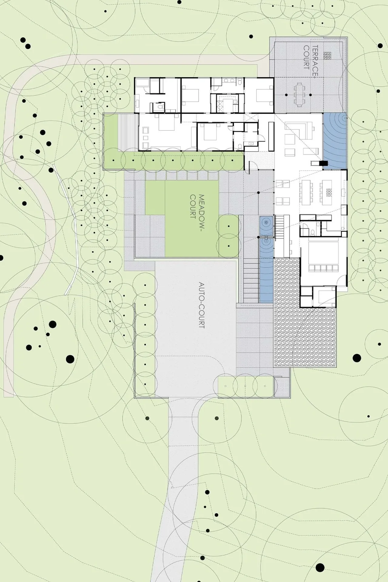 Site plan for Inside Outside House with labeled courtyard areas, auto court, and landscaping around a modern house design.