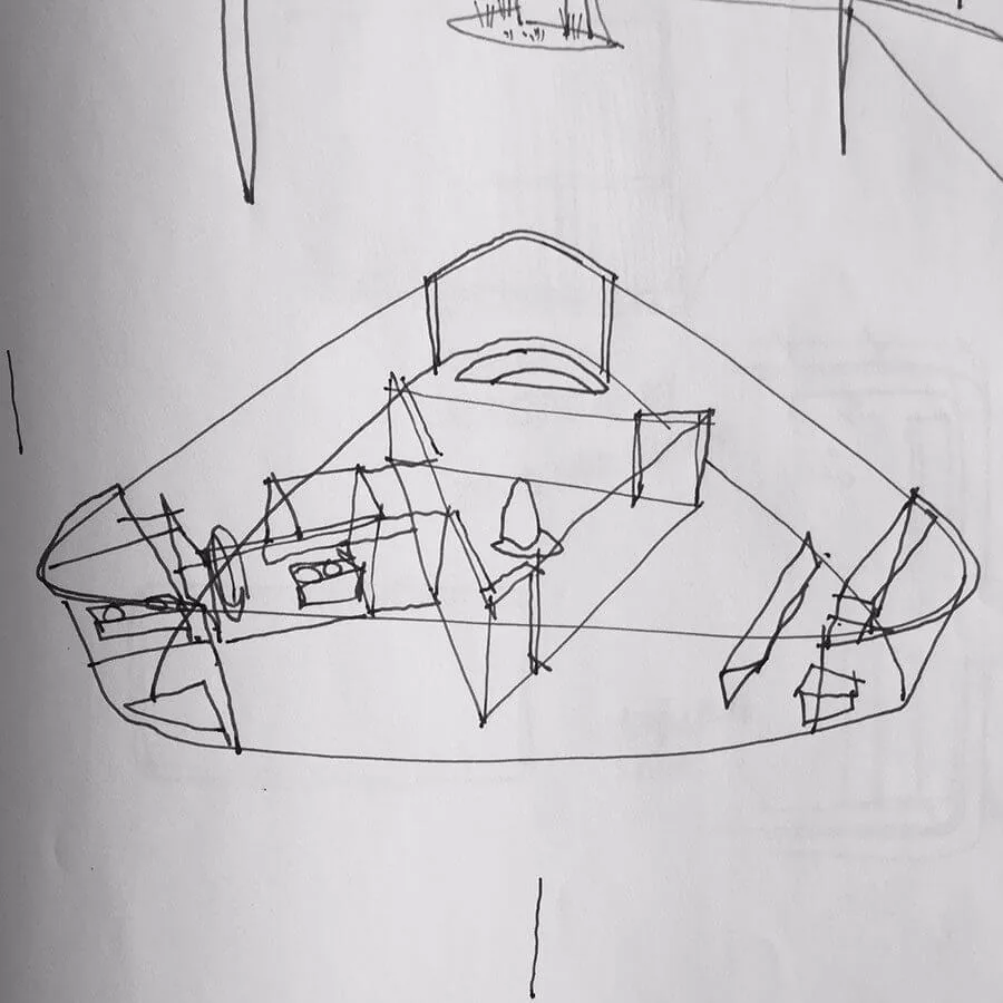 Hand-drawn schematic sketch showing an interior space with partition walls and furniture outlines.