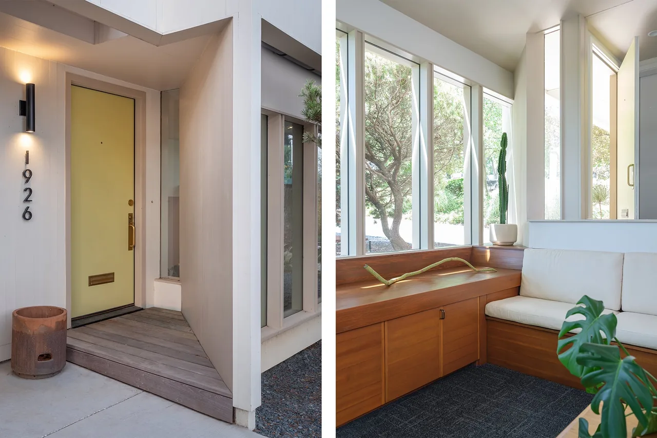 The project features a distinct yellow front entry door and an interior living nook with custom wood built-ins and floor-to-ceiling glazing.