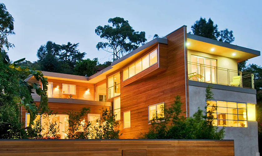 Exterior view of the RIDPATH project showing wood siding and extensive glazing by internForm Architecture.
