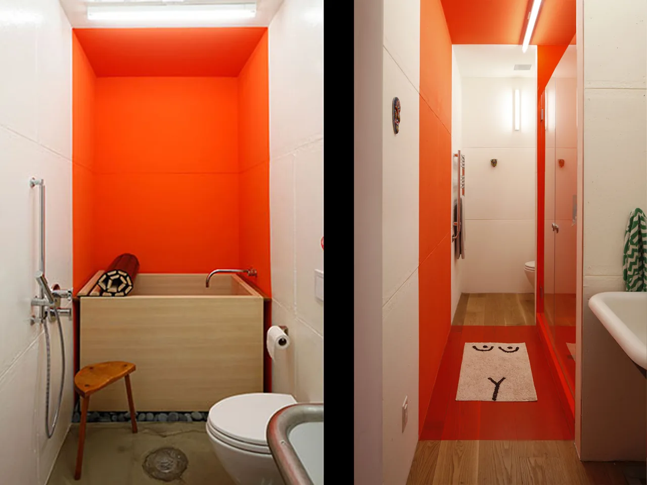 Bathroom features a wooden soaking tub against an orange accent wall and a hallway with red flooring in the Irving Place Carriage House.