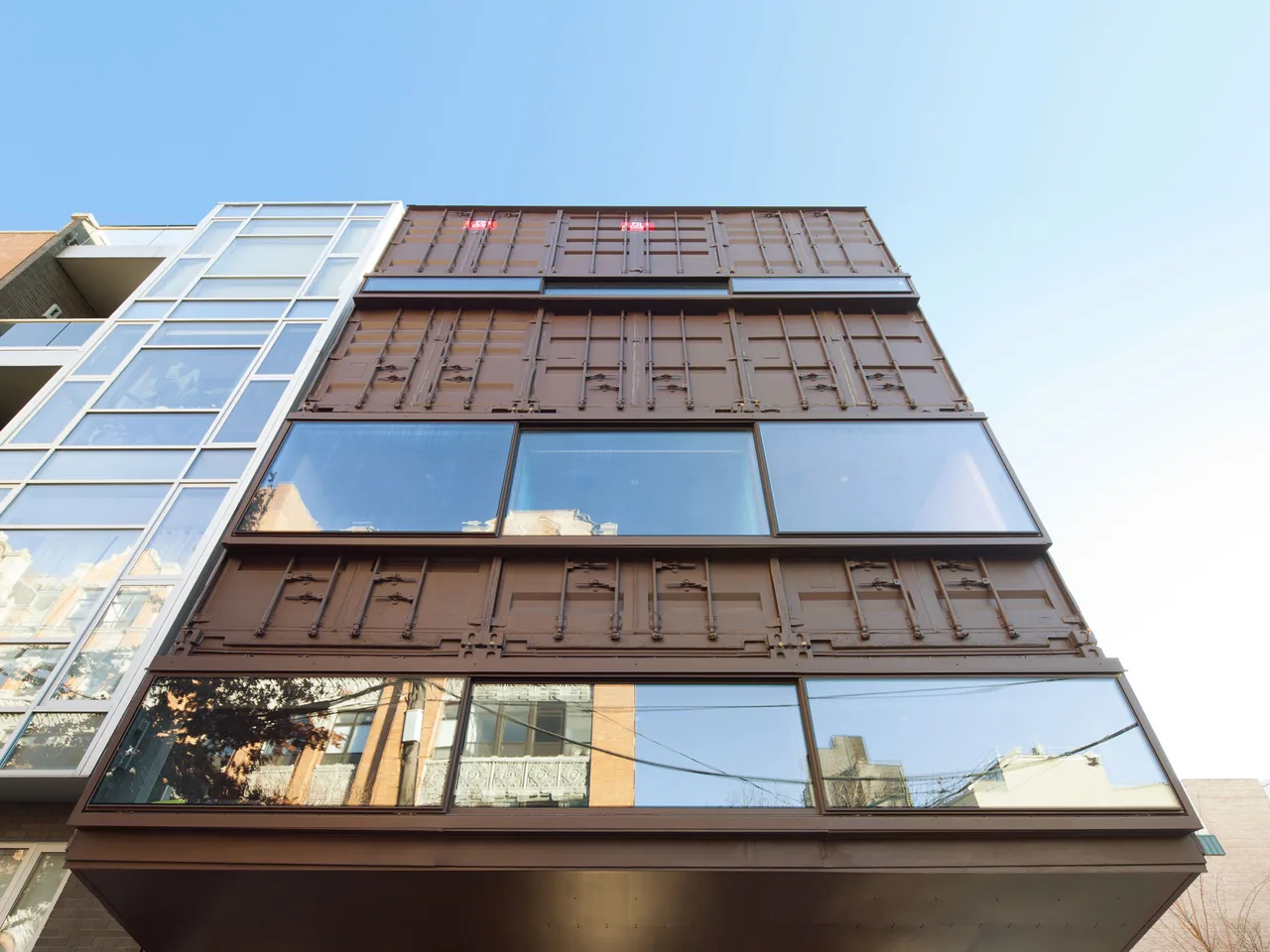 The Carroll House features a shipping container facade with expansive windows designed by LOT-EK in New York.