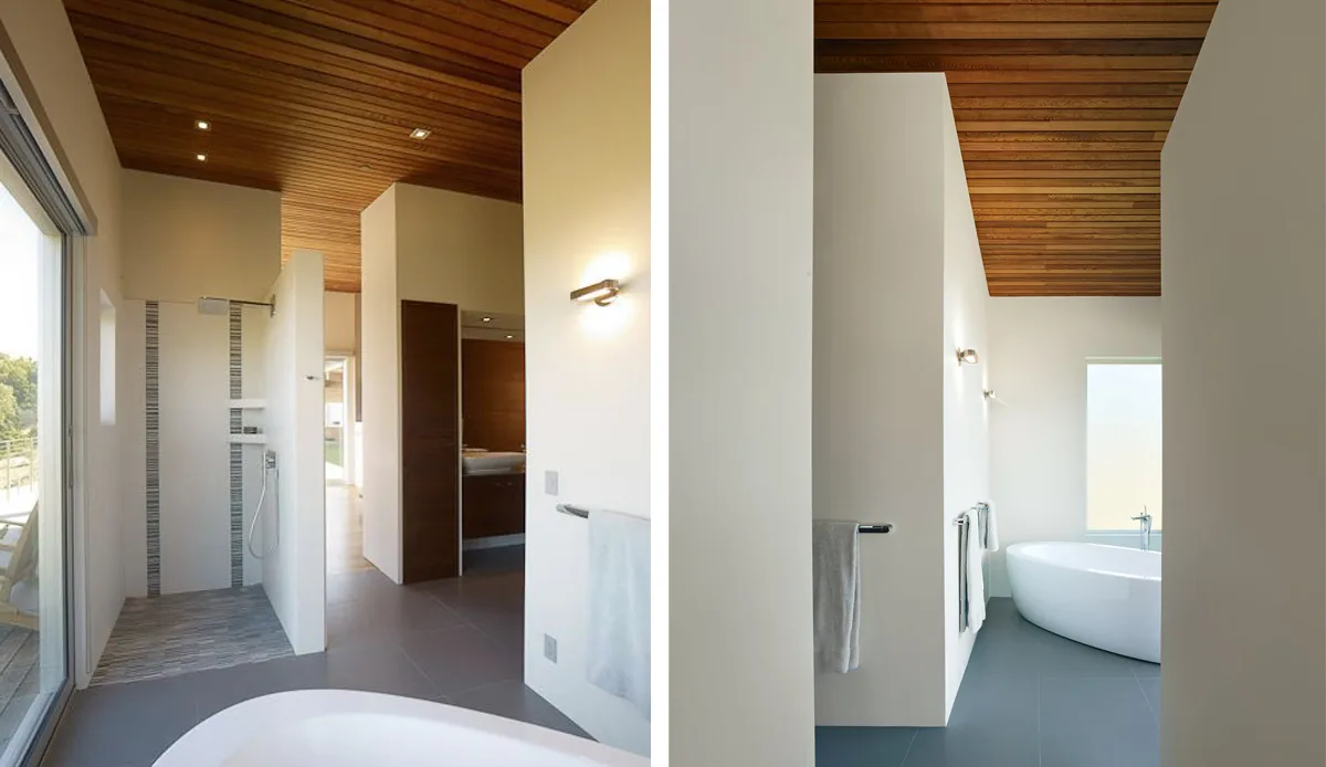 Bathroom features a freestanding tub, walk-in shower, and wood-paneled ceiling with recessed lighting.