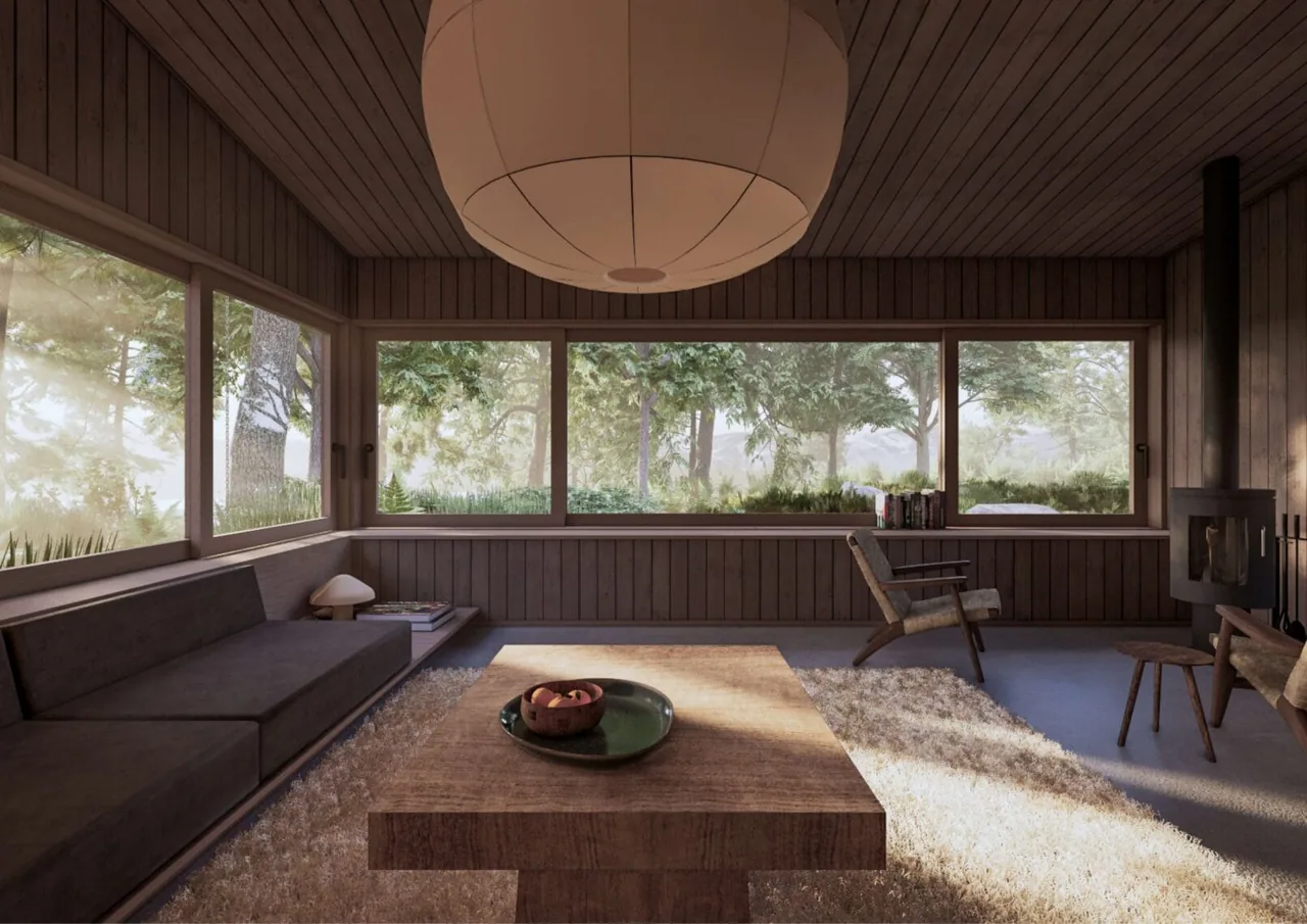 Living room of the Whidbey Bluff House featuring wood paneling, large windows, and a suspended modern fireplace stove.