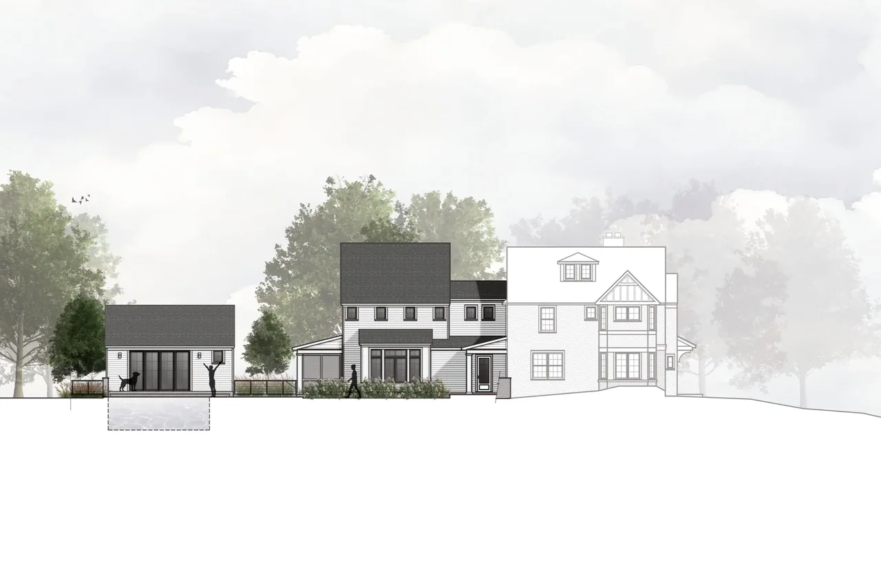 Elevation drawing depicts a rear exterior view with multiple gable roofs and a detached garage on the left.