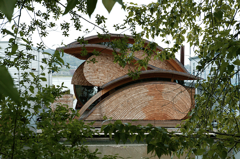 Fennel Residence designed by Robert Harvey Oshatz Architect features a unique curved wood roof near Portland waterfront.