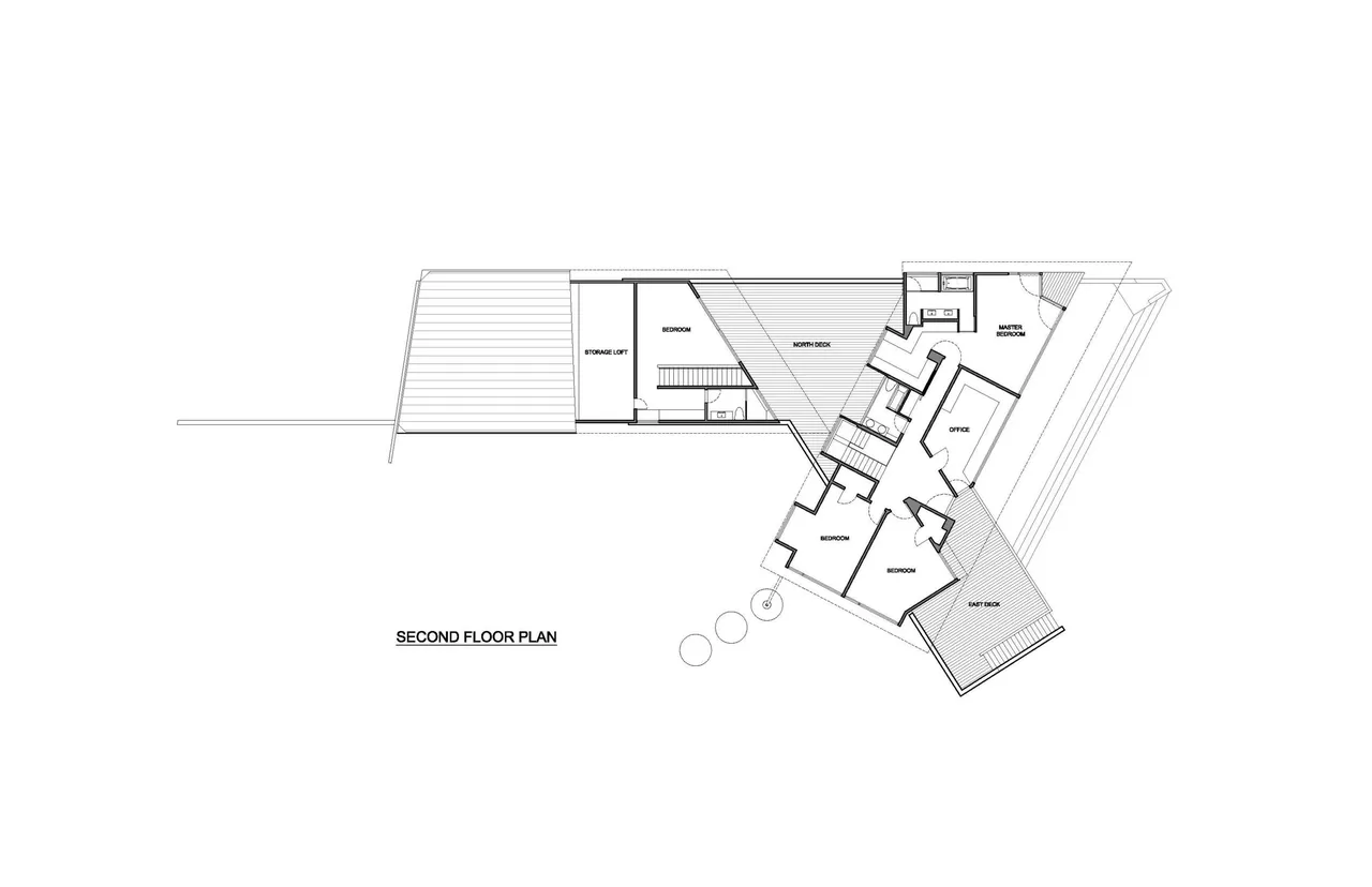Second floor plan of a residential house showing bedrooms, office, storage loft, and decks.