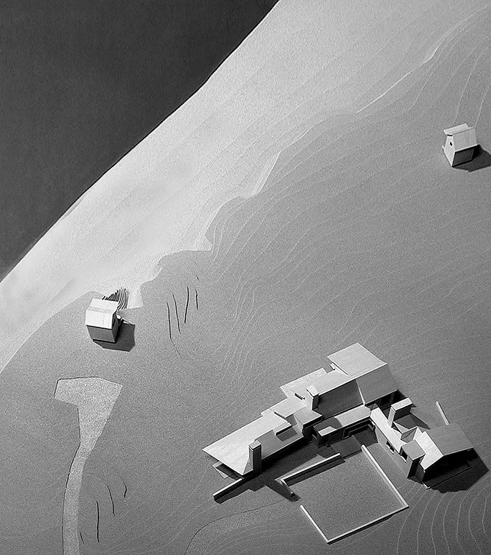 Aerial shot of a modern architectural model highlighting the layout of the Vineyard Residence project by Peter Rose + Partners.