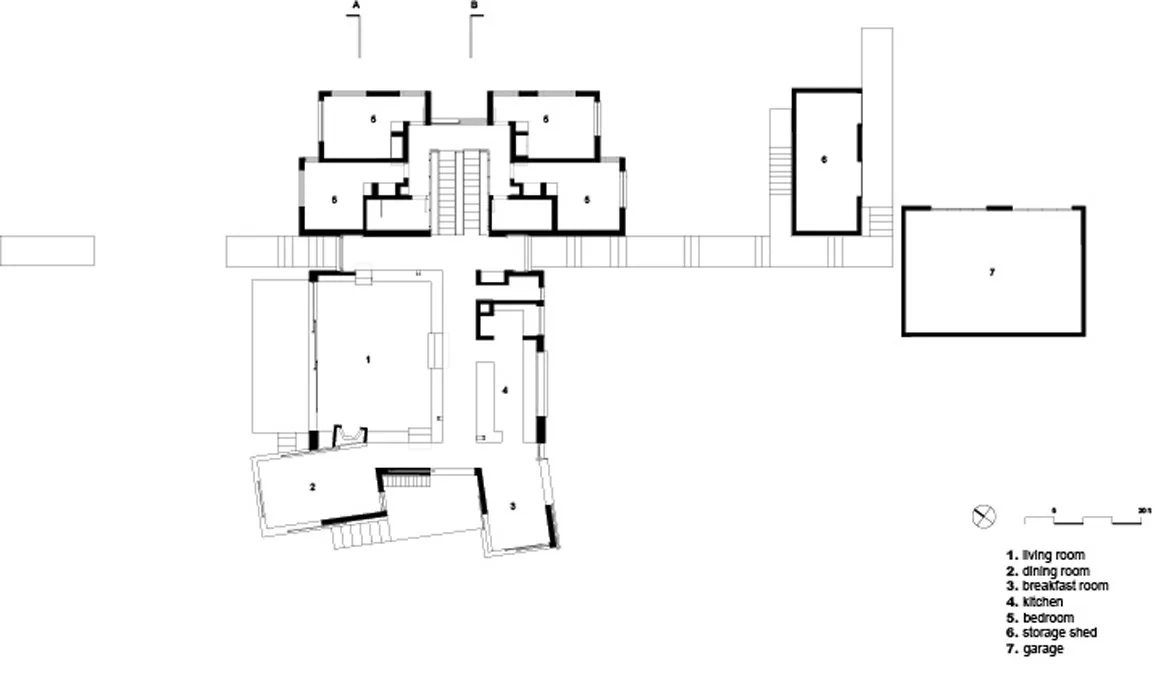 Floor plan of Island Residence with labeled rooms including living, dining, kitchen, bedrooms, storage, and garage.