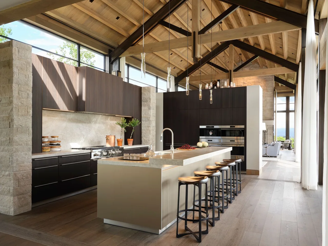 Kitchen interior of Morning Star Residence by Poss Architecture + Planning with vaulted wood ceiling and modern cabinetry.