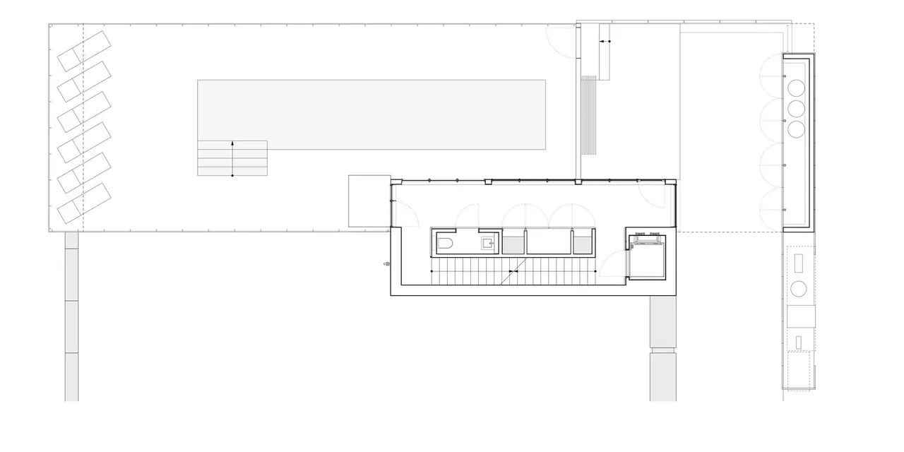 Floor plan of the outdoor porch area and adjacent rooms with kitchen island and stair details visible.