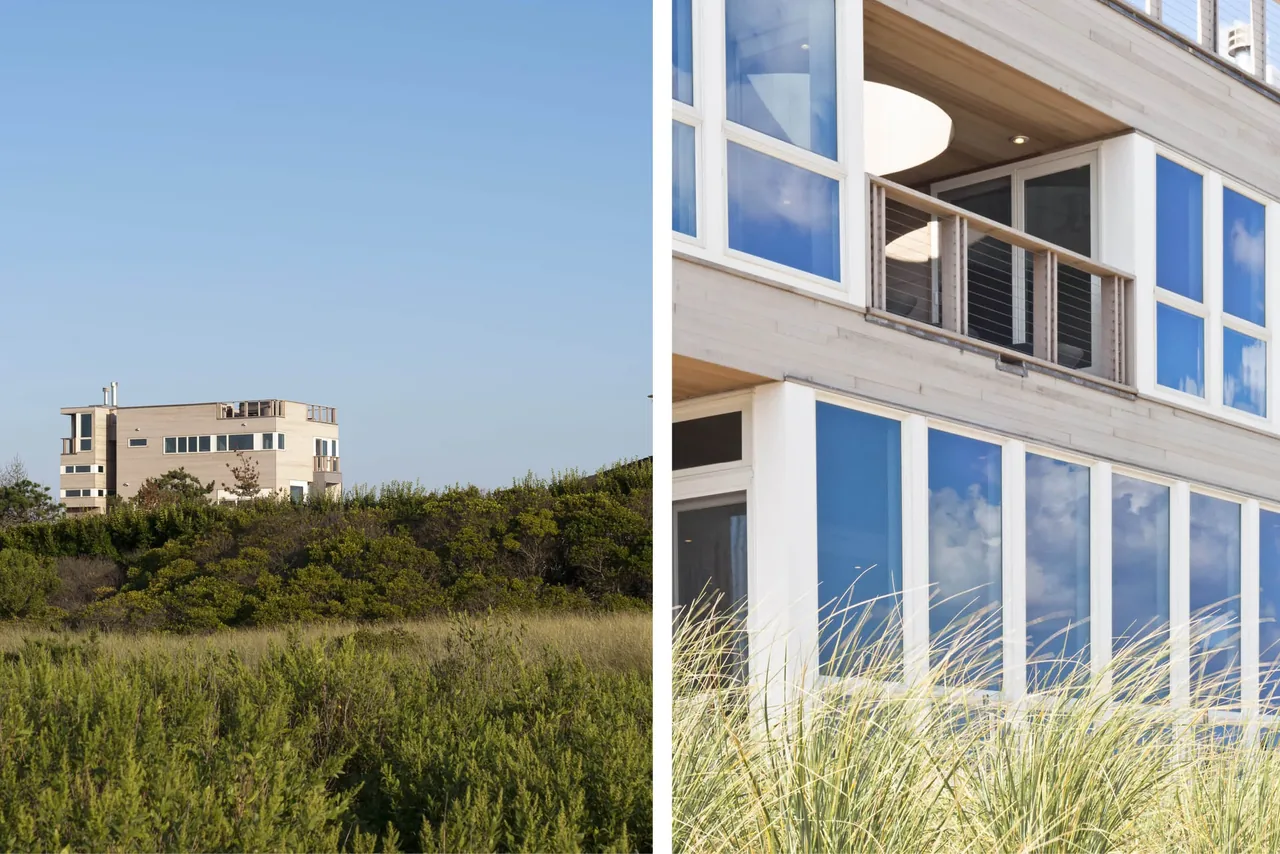 The Dune Road Beach House in East Quogue features vertical and horizontal expanses of glass windows and light wood siding.