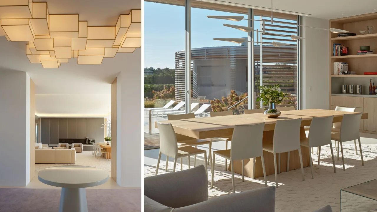 Dining room with wooden table and white chairs looking out to outdoor loungers and a wooden slat screen on the porch house.