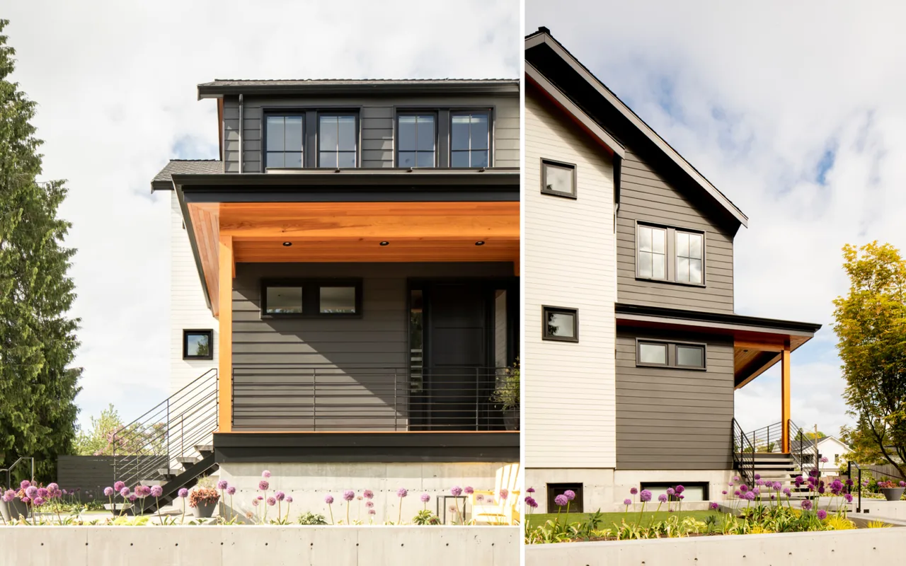 Queen Anne Transitional house features mixed light and dark horizontal siding with black-framed windows and a covered porch under a gable roof.