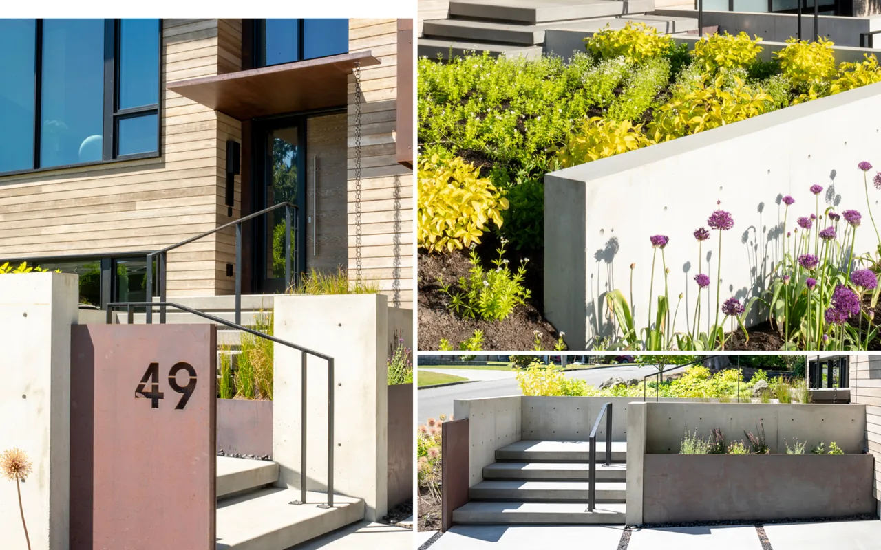 Bellevue Split-Level features horizontal wood siding, illuminated windows, and a concrete driveway with planted landscaping and steel house numbers.