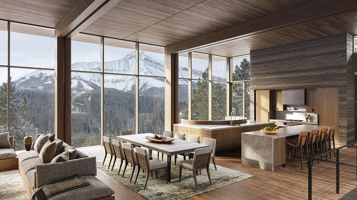 Living, dining, and kitchen areas with large windows framing snow-covered mountains in the background.