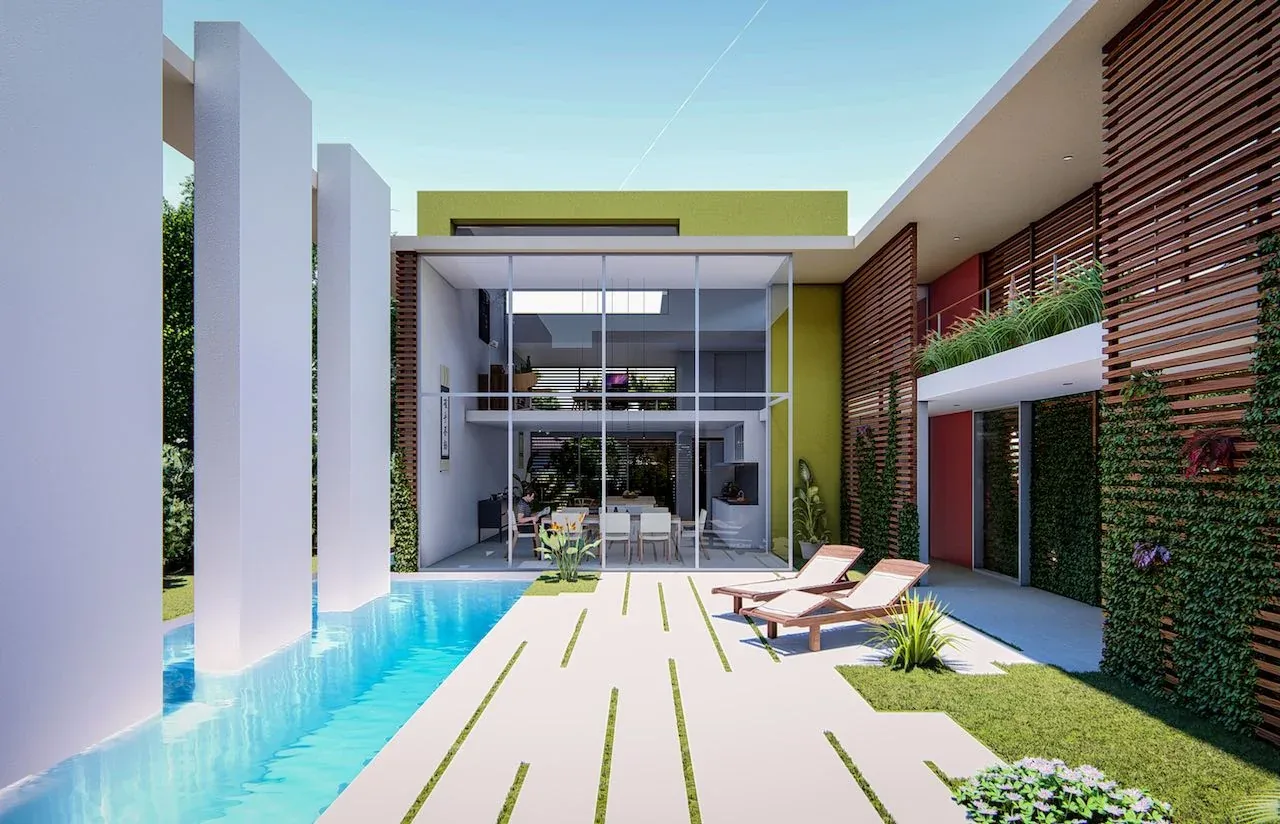 WILTON HOUSE features a two-story glass front and a pool adjacent to outdoor seating with wood slat screens on the walls.