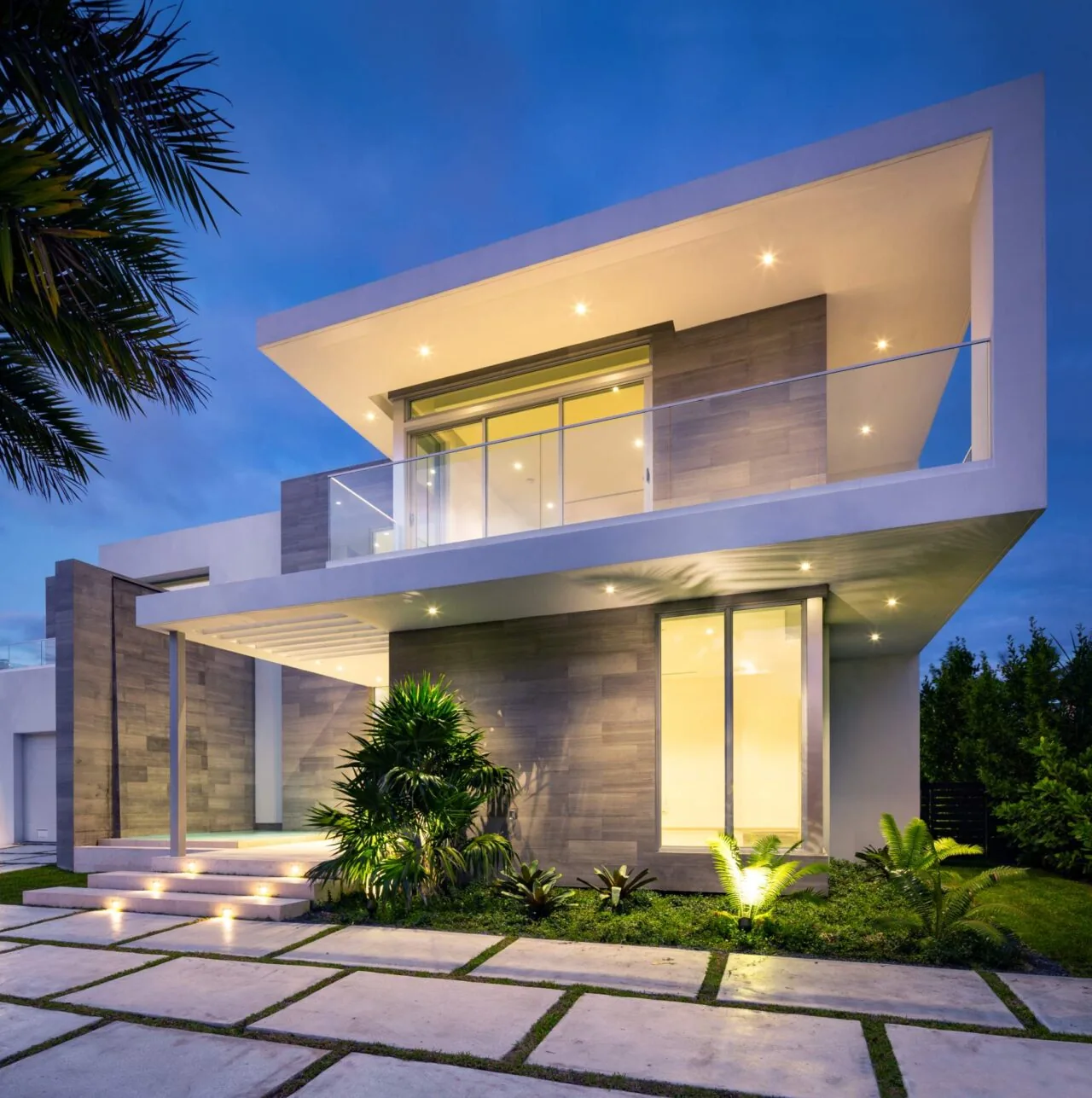 The 301 Residence features a modern design with clean lines, flat roof, and extensive glazing.